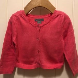 pink cardigan sweater